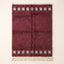 Burgundy Beni Ourain rug with mint green stacked squares in bands at top and bottom, full flat view
