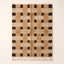 Camel, cream and cocoa brown Beni Ourain rug with checkerboard block pattern, flat lay on plain background