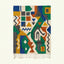 Full view of the Awragh Boujaad rug in green, mustard, cobalt, terracotta and cream with symbolic geometric patchwork