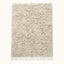 Ivory Beni Ourain rug with soft undyed pile on plain background, full flat view