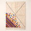 Ivory and multicolor Azilal rug with checker drift pattern, full view on plain background