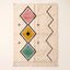 Ivory Beni Ourain rug with vertical broken diamond design in rose, gold and teal with black outlines and cream cross accents