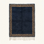 Full view of the Isli navy and ochre Beni Ourain rug with an ivory double border.