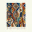 Full view of the Azwawen Boujaad rug in navy, terracotta, teal and cream with stacked diamonds and linear symbols