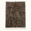 Taupe Beni Ourain rug with undyed ivory fringe, full flat view showing organic shag texture