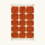 Full view of the Tifawt terracotta and ivory Beni Ourain rug with a rounded grid design.