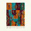 Full view of the Azru turquoise, orange and burgundy Boujaad rug with a geometric symbol patchwork design.