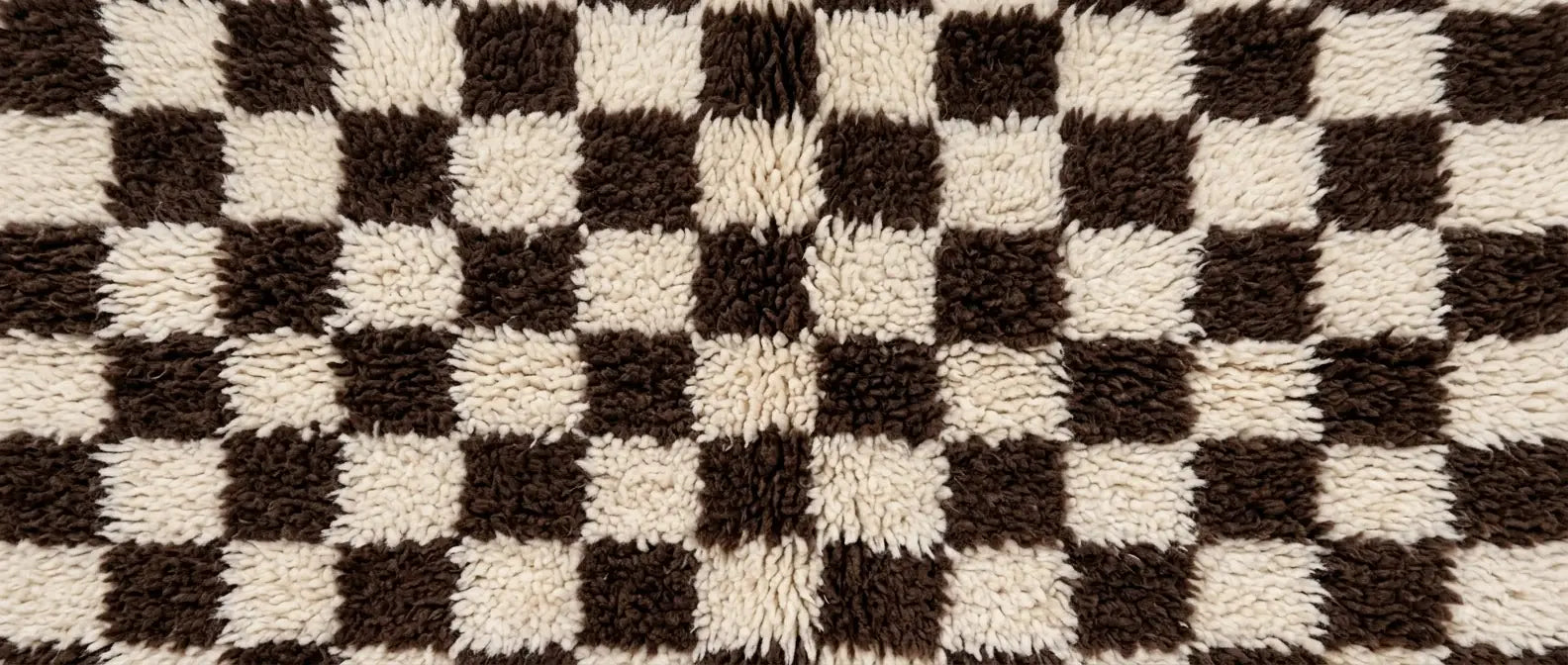 Handmade Moroccan wool rug with checkered grid pattern