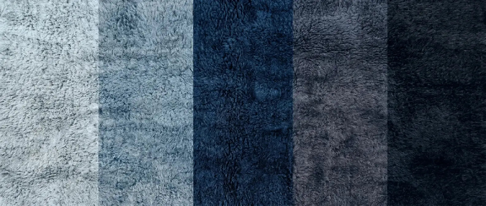 Handmade Moroccan wool rug in navy, indigo, and sky-blue tones
