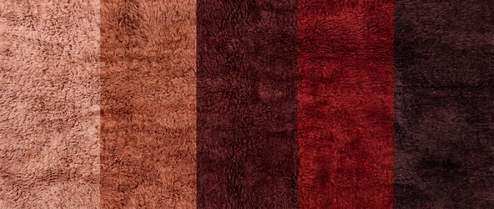 Handmade Moroccan wool rug in crimson, burgundy, and warm red tones