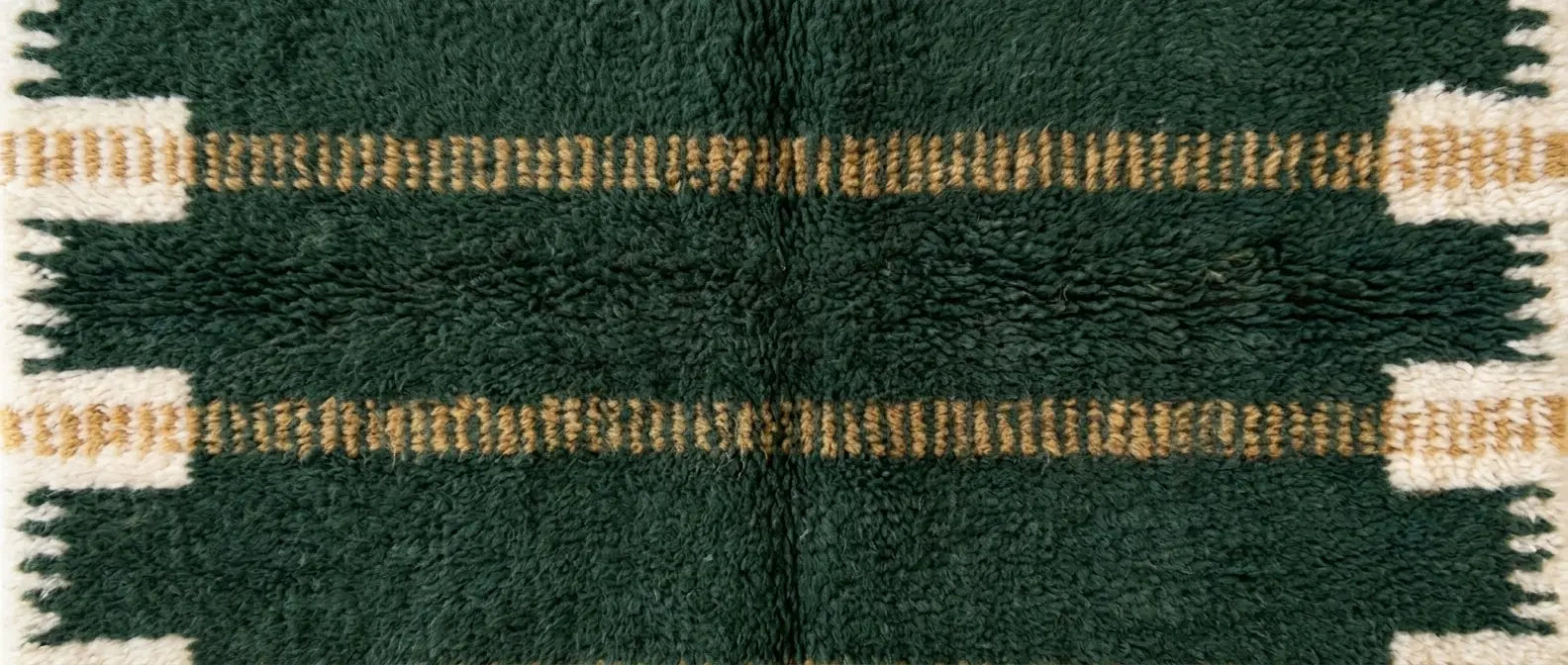 Handmade Moroccan wool rug with clean linear pattern