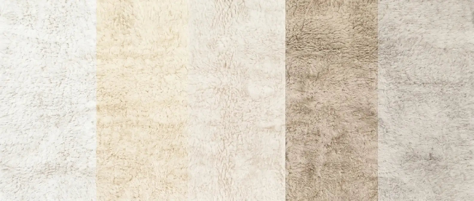 Handmade Moroccan wool rug in ivory, cream, and white tones