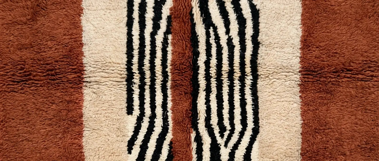 Handmade Moroccan wool rug with abstract free-form pattern