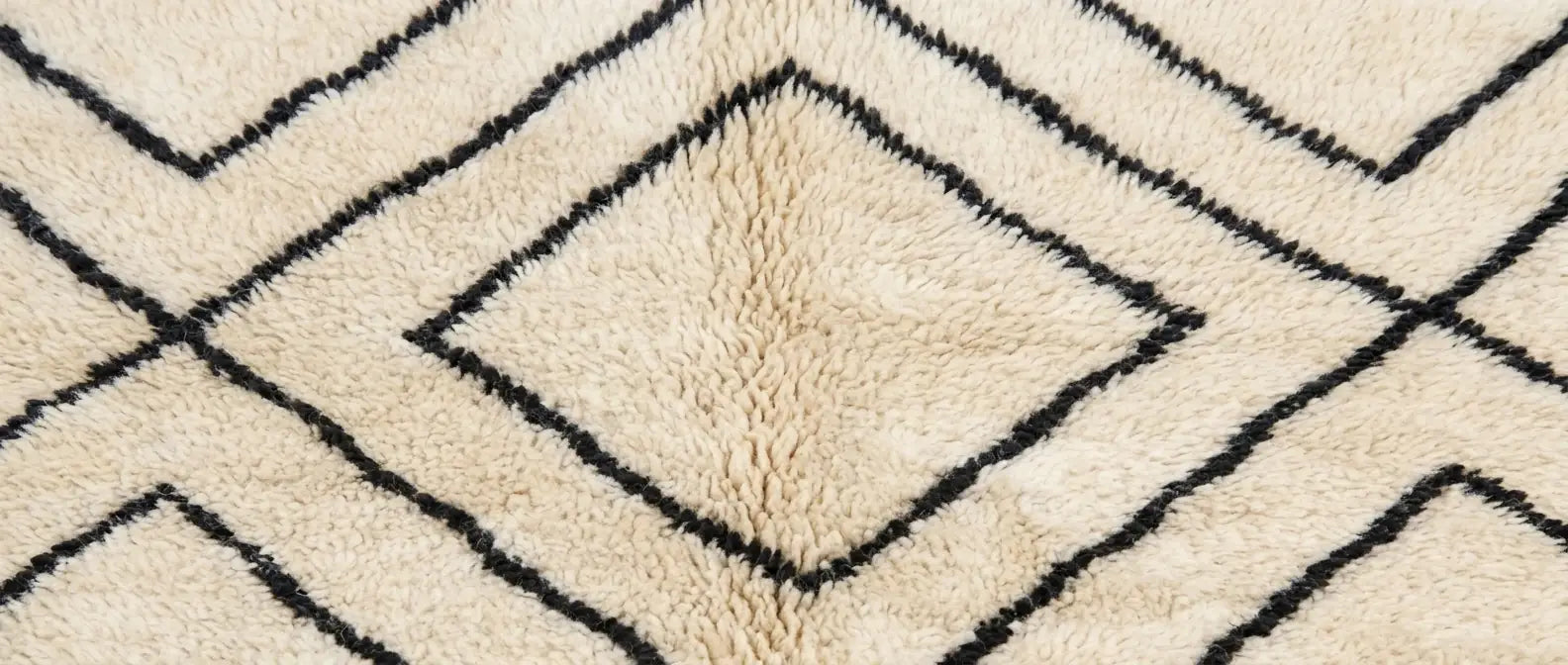 Handmade Moroccan wool rug with classic diamond pattern