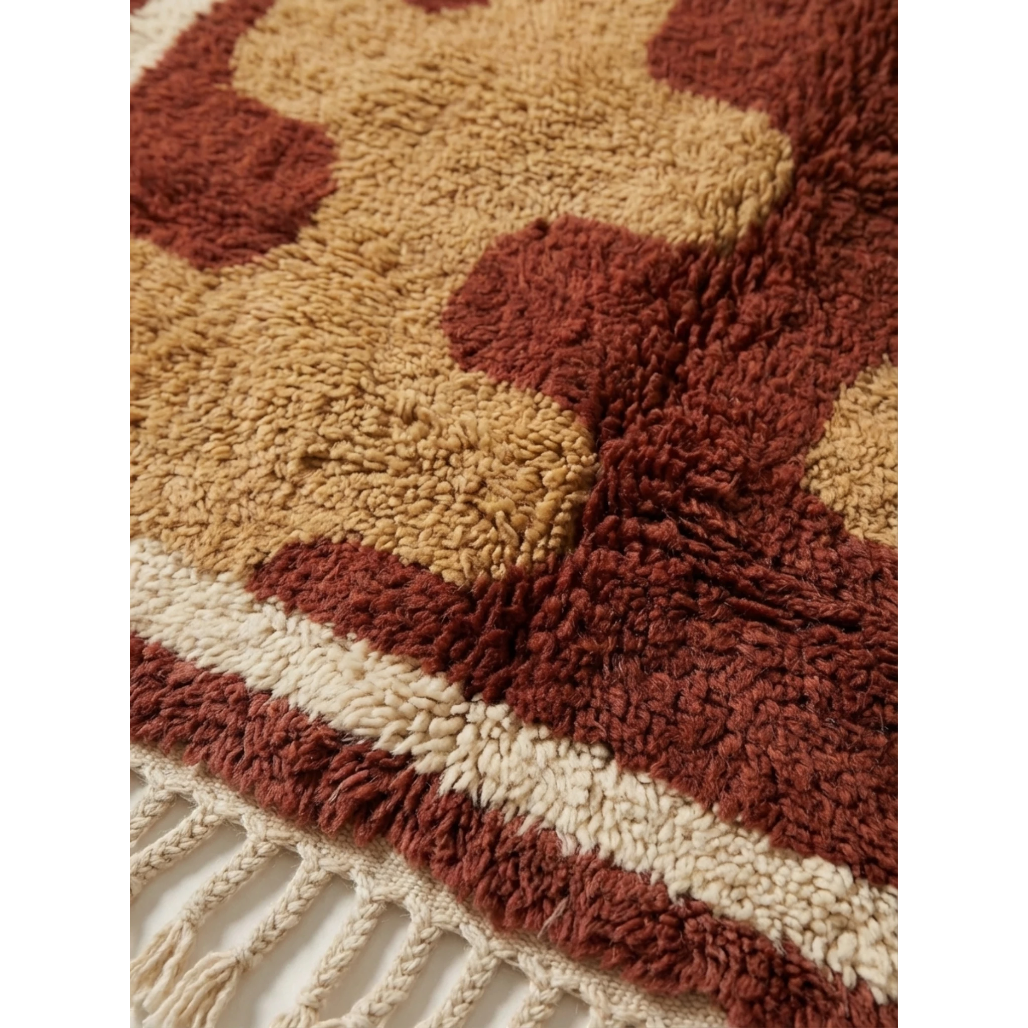 Pattern detail of the Aderfi Beni Ourain rug with terracotta and camel abstract forms.