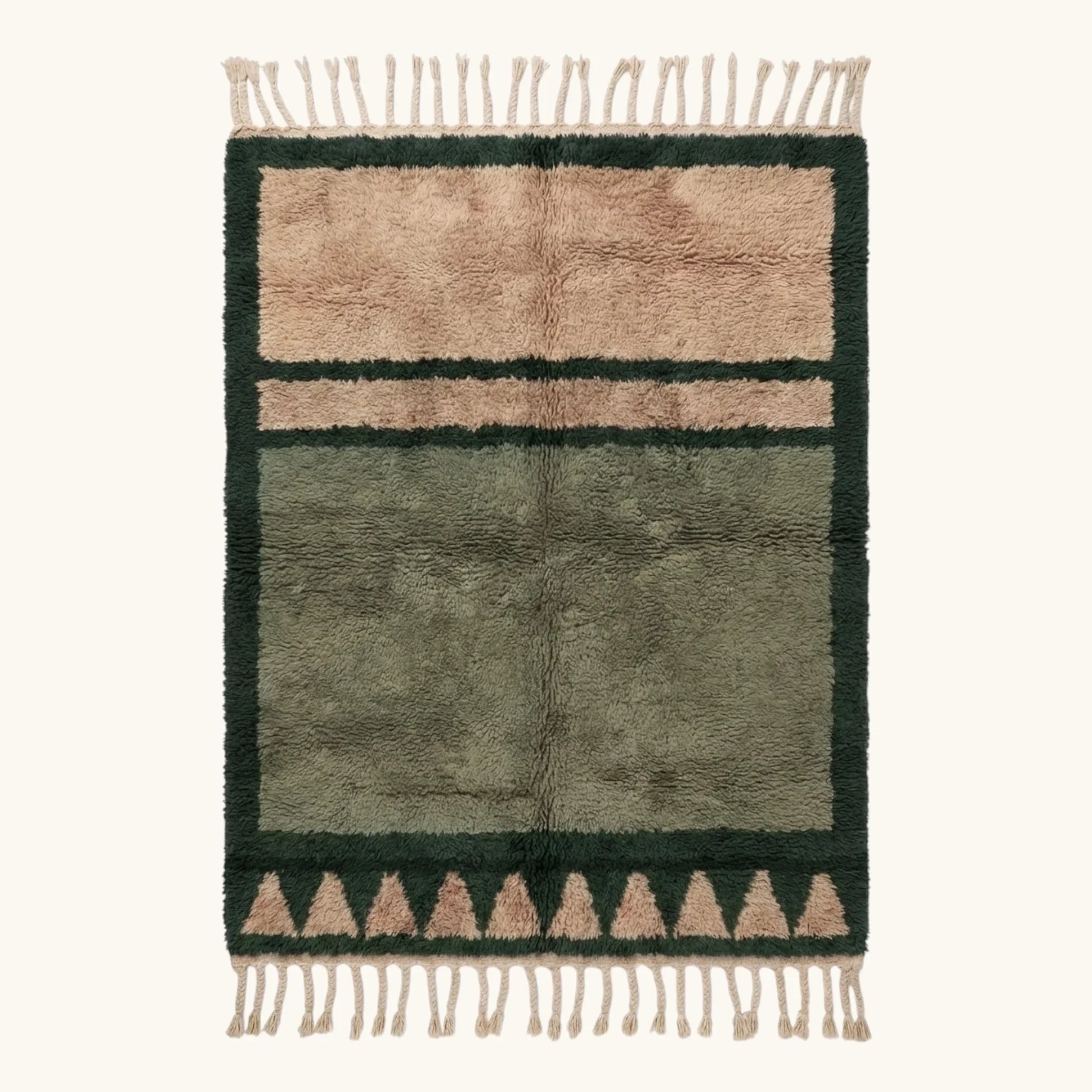 Full view of the Agbalou olive Beni Ourain rug with a framed triangle motif and hand-tied fringe.