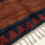 Aksel rust and navy Beni Ourain rug hand-knotted fringe detail