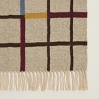 Beige Zanafi rug Amerzgane grid border and fringe detail