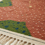 Blush Zanafi rug Amezmiz dotted field, olive corner and fringe detail