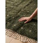 Soft natural wool pile of the Amnay green Beni Ourain rug.
