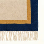 Ivory, navy and ochre Zanafi rug Aqqa with double border design, border and fringe detail