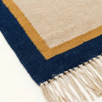 Ivory, navy and ochre Zanafi rug Aqqa with double border design, pattern close-up
