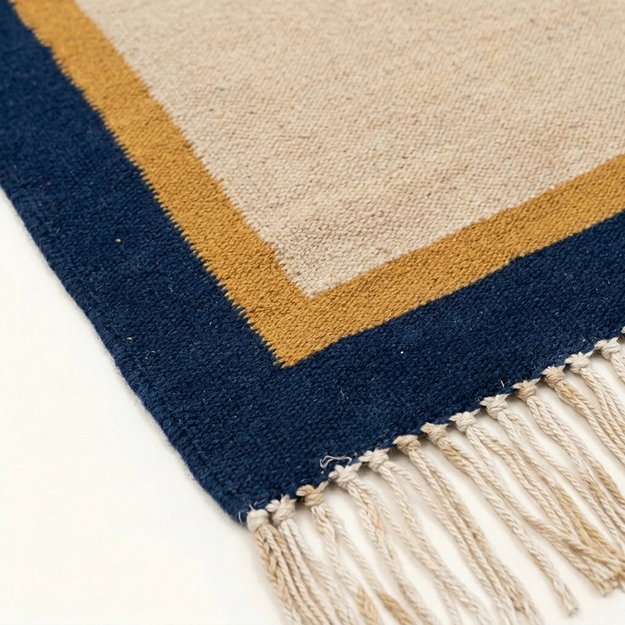 Ivory, navy and ochre Zanafi rug Aqqa with double border design, pattern close-up