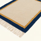 Ivory, navy and ochre Zanafi rug Aqqa with double border design, weave and fringe detail
