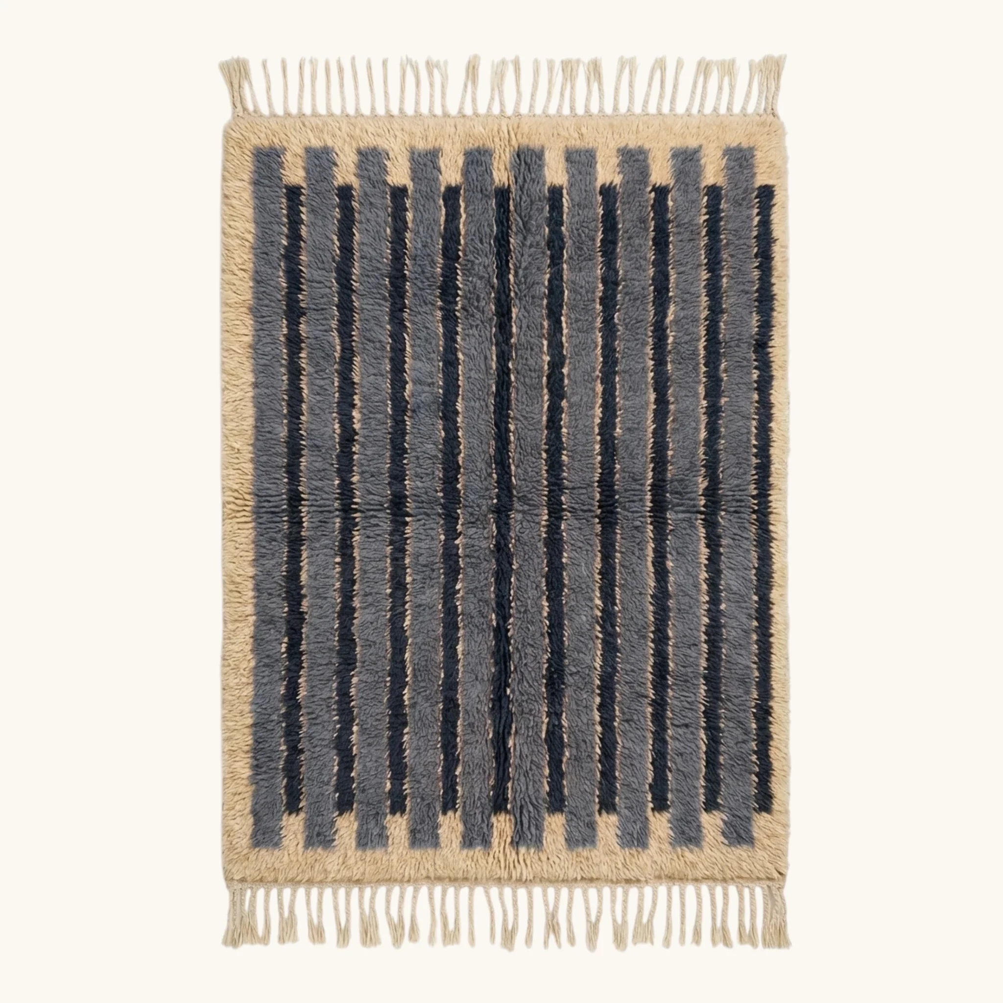 Full view of the Asif blue Beni Ourain rug with contemporary stripes and hand-tied fringe.