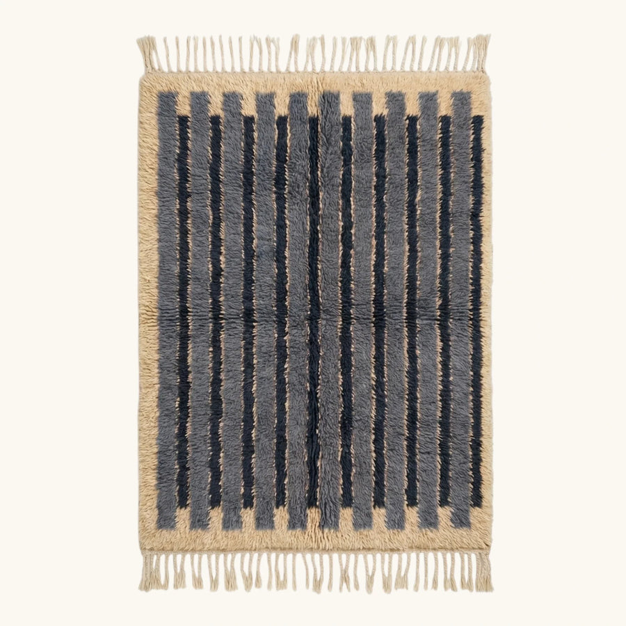 Full view of the Asif blue Beni Ourain rug with contemporary stripes and hand-tied fringe.
