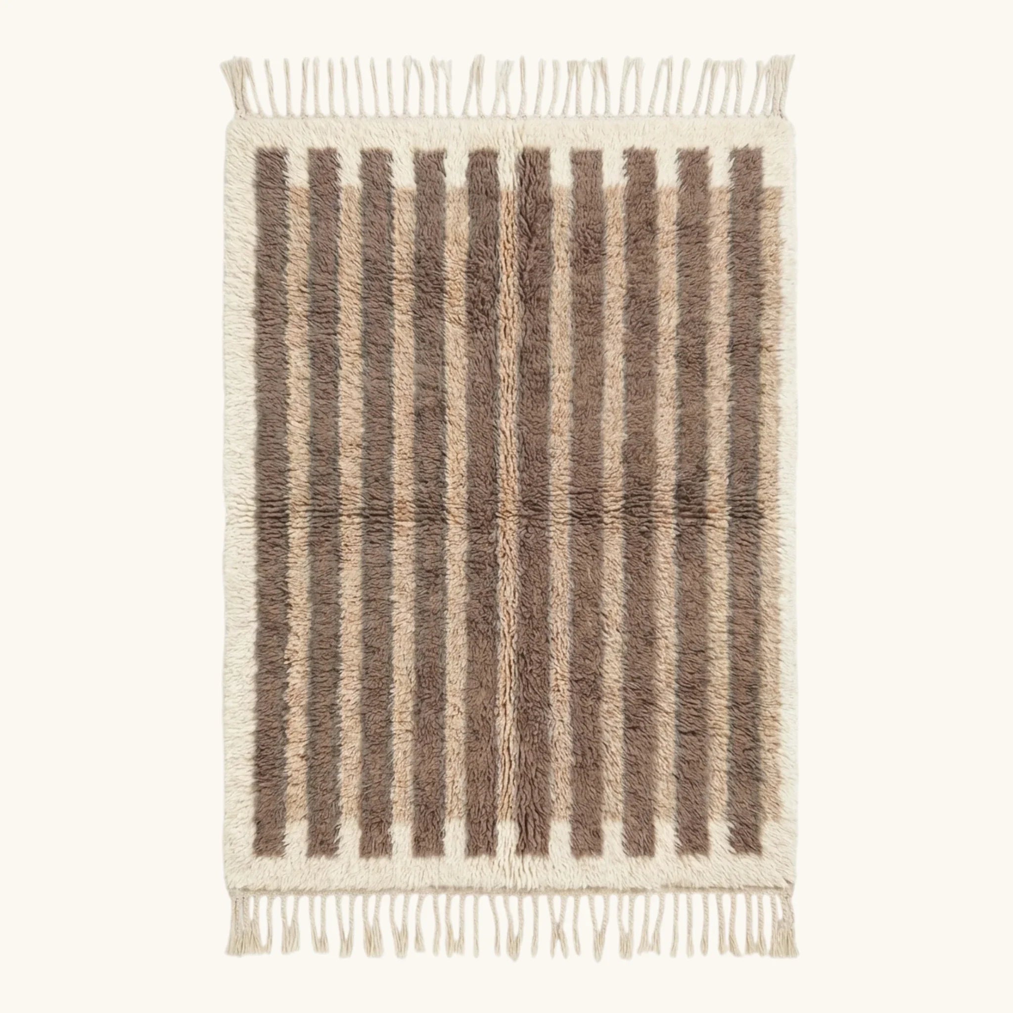 Full view of the Aylal taupe Beni Ourain rug with minimalist stripes and hand-tied fringe.
