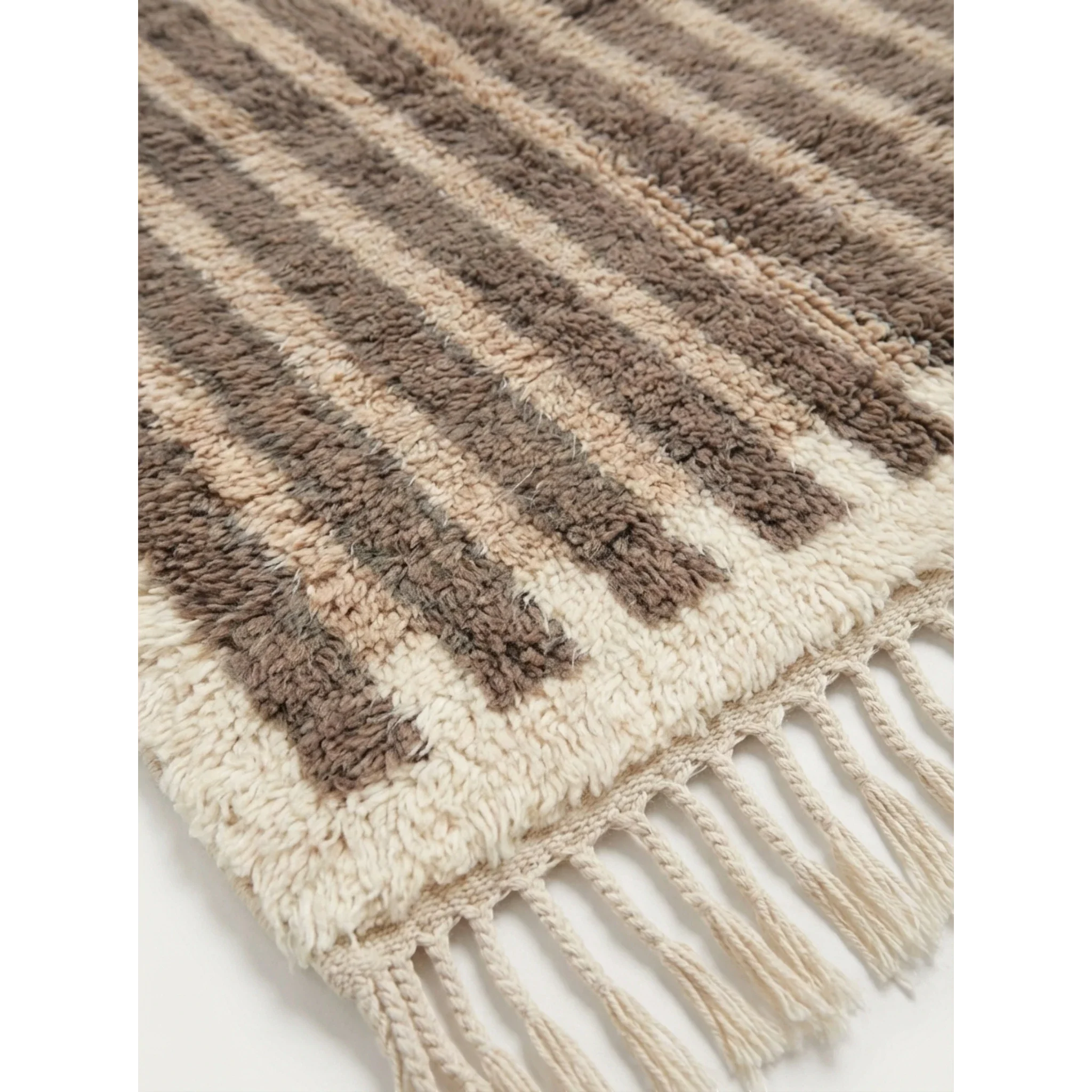 Close-up of the taupe and ivory striped pattern on the Aylal Moroccan rug.