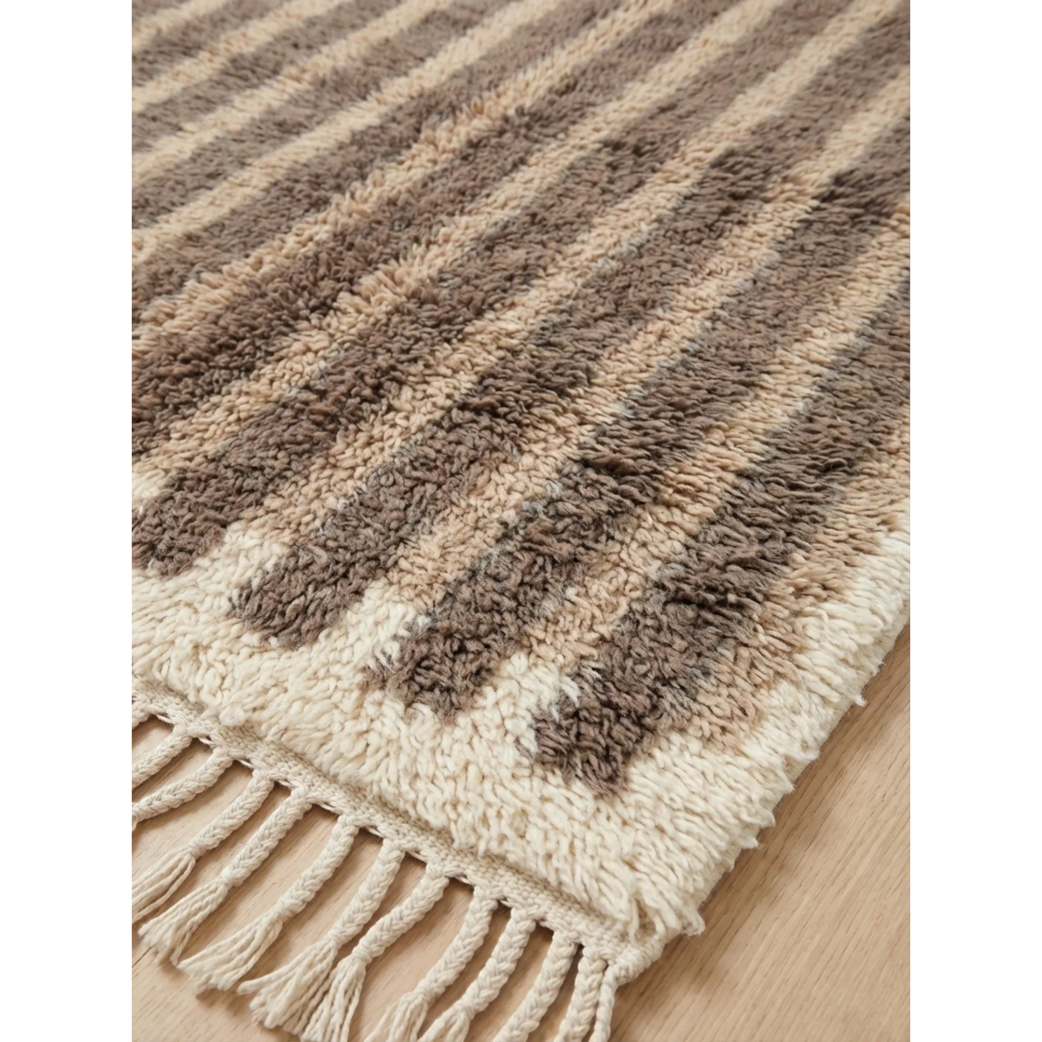 Natural wool texture detail of the Aylal taupe Beni Ourain rug.