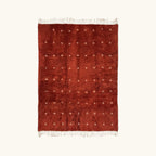 Full view of the Azru terracotta Beni Ourain rug with small ivory cross motifs.