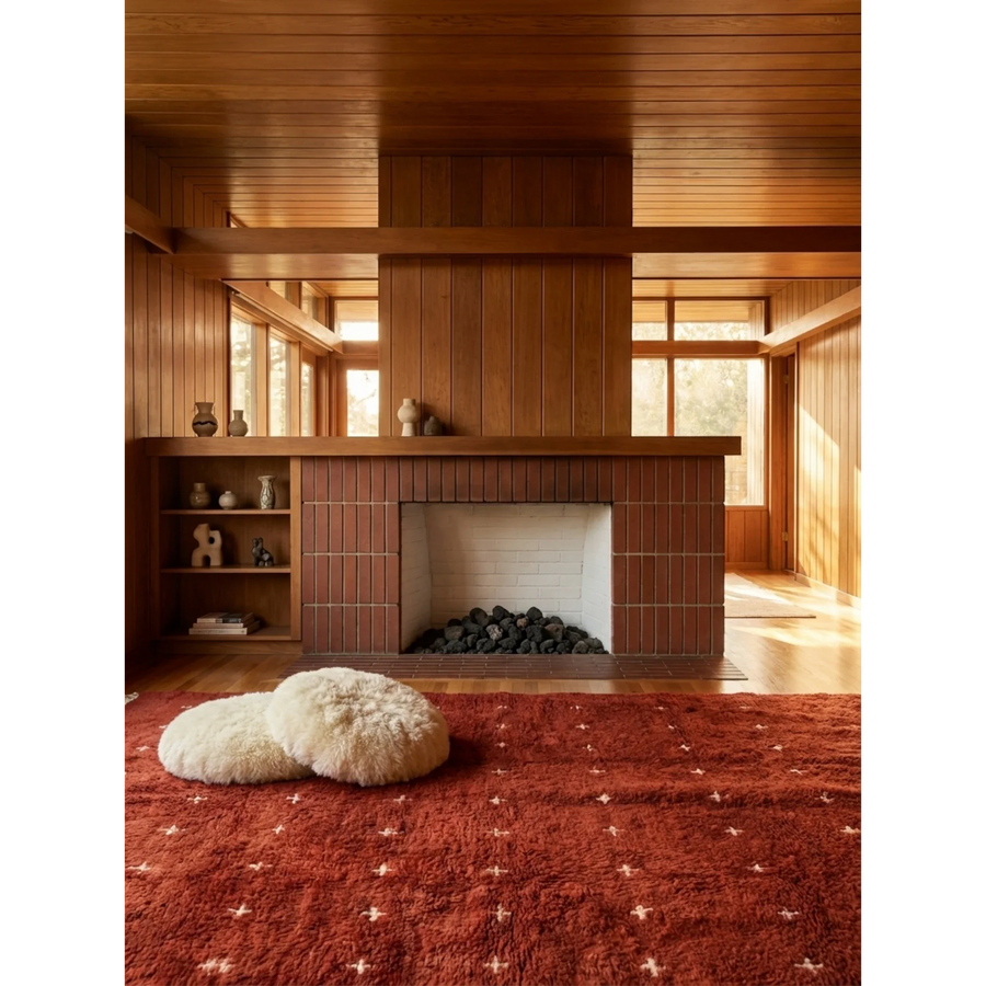 Azru terracotta Beni Ourain rug styled in a warm modern Moroccan interior.