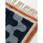 Border detail of the Azul Beni Ourain rug showing navy, powder blue, ivory and rust wool.