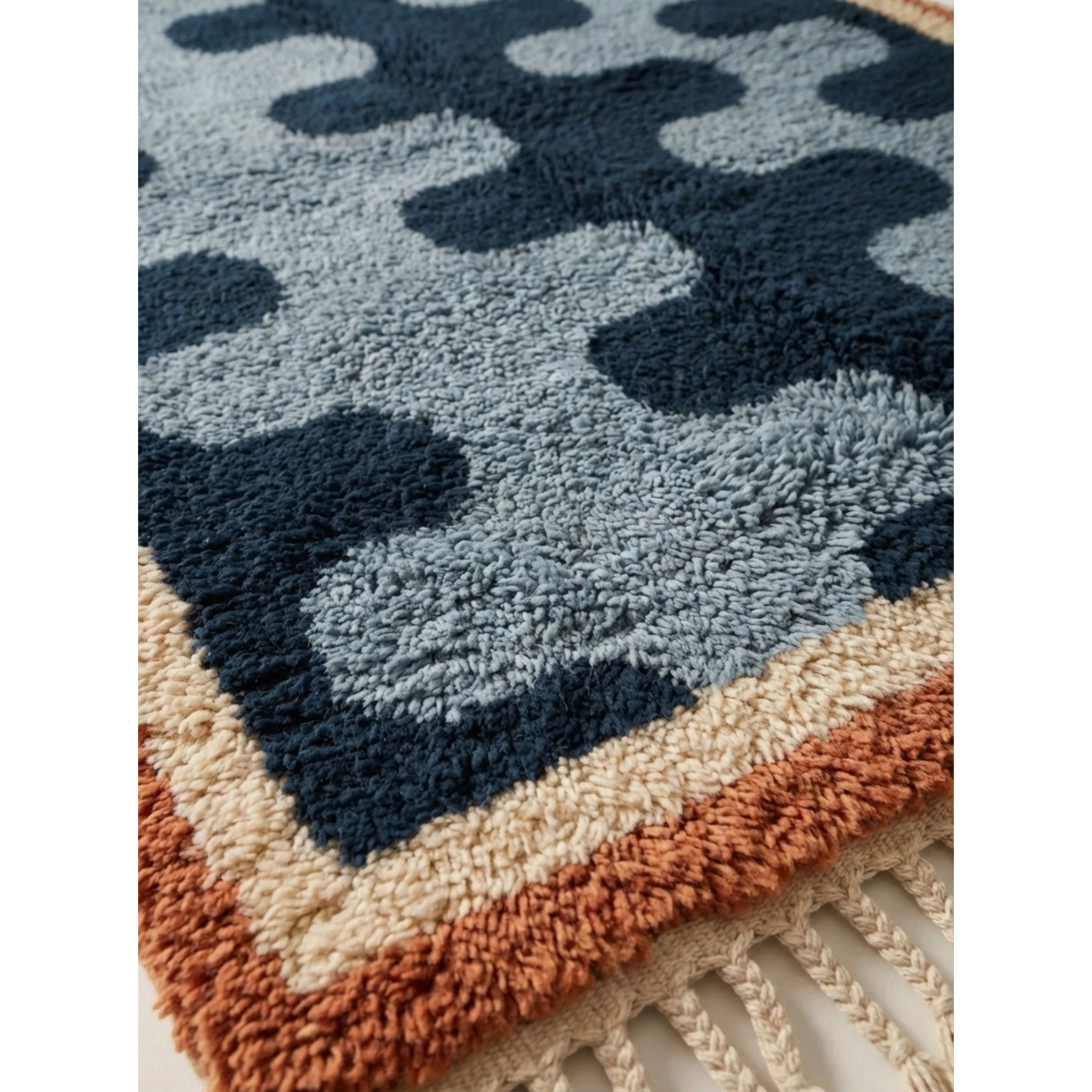Pattern detail of the Azul navy blue Beni Ourain rug with alternating abstract blue forms.