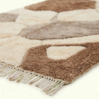 Ivory & Brown Mrirt rug Amrhar, organic patchwork fringe detail