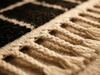 Close-up of twisted fringe edge and handwoven construction on Tilelli Mrirt runner