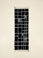 Black, charcoal and ivory Mrirt runner Tilelli with geometric grid check pattern, flat lay view
