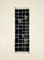 Black, charcoal and ivory Mrirt runner Tilelli with geometric grid check pattern, flat lay view