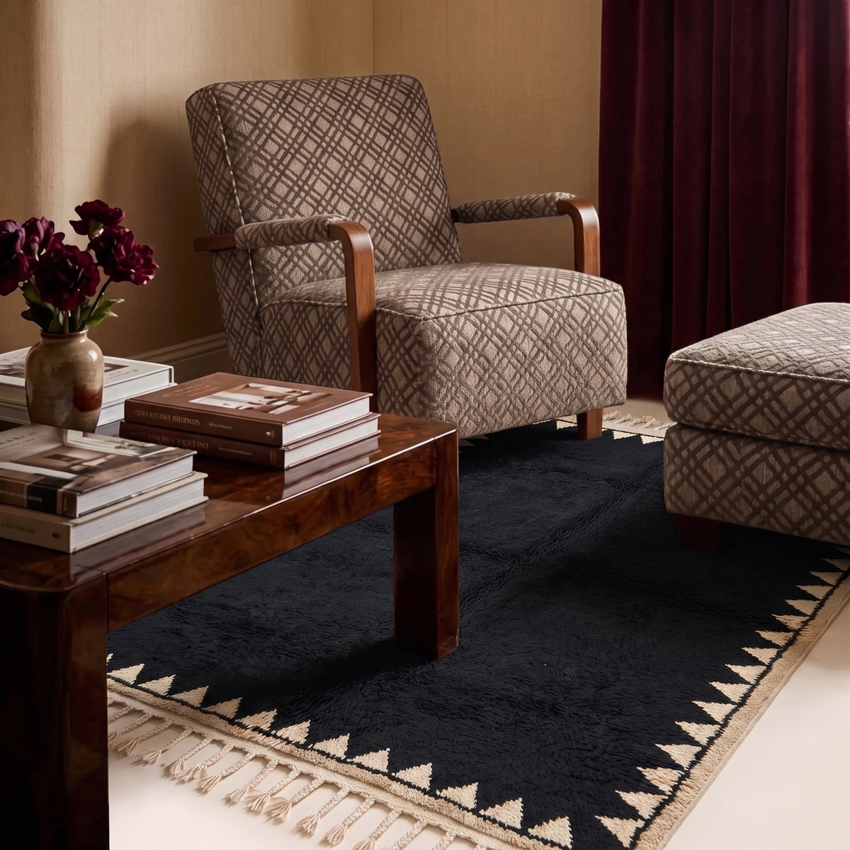Black Beni Ourain rug with sawtooth border in living room setting with wooden table, upholstered chair and flowers