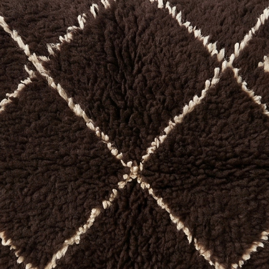 Close-up of the night grid pattern on the Ayur Moroccan wool pillow