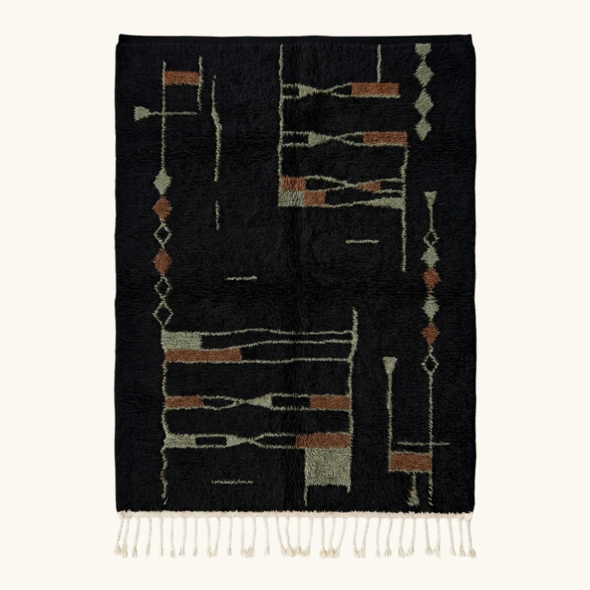Full view of the Aghbal black, terracotta and olive Beni Ourain rug with an abstract linear design.