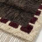 Brown and burgundy Beni Ourain rug detail