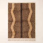 Fawn Beni Ourain rug with brown and ivory vertical speckled stripes and dark central line, flat view