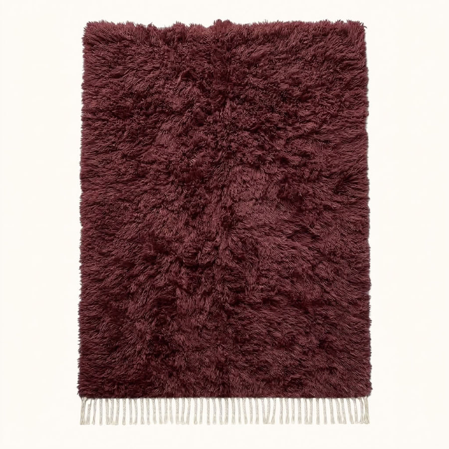Burgundy Beni Ourain rug Tafat with thick textured pile and ivory fringe, flat lay
