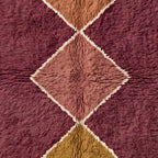 Full vertical stack of three diamonds with soft wool texture