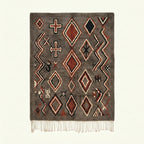 Charcoal Azilal rug Tafrawt with coral diamonds, full rug view