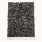 Charcoal Beni Ourain Rug – Textured Pile – Dihya, flat lay on plain background showing full rectangle with ivory fringe